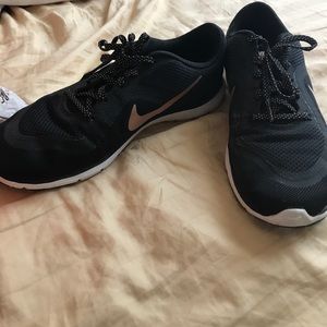 Nike black and gold training shoes