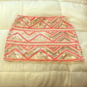 Express Seguined mini skirt in pink and gold
