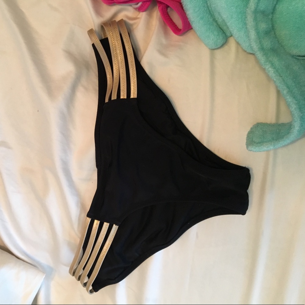 Black and gold strapy bathing suit bottoms