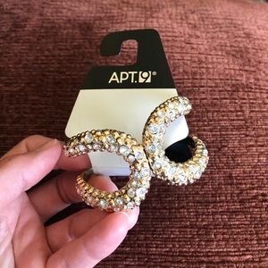 Gold bracelet with clear gems