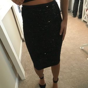 Black sequin midi skirt
