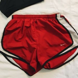 Red NIKE tempo shorts