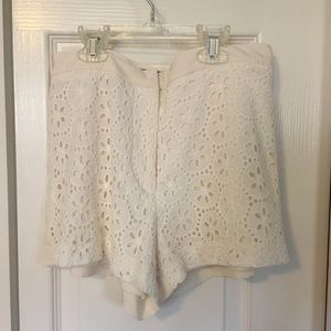White eyelet shorts.
