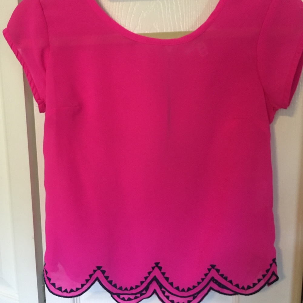 Pink and navy blouse.