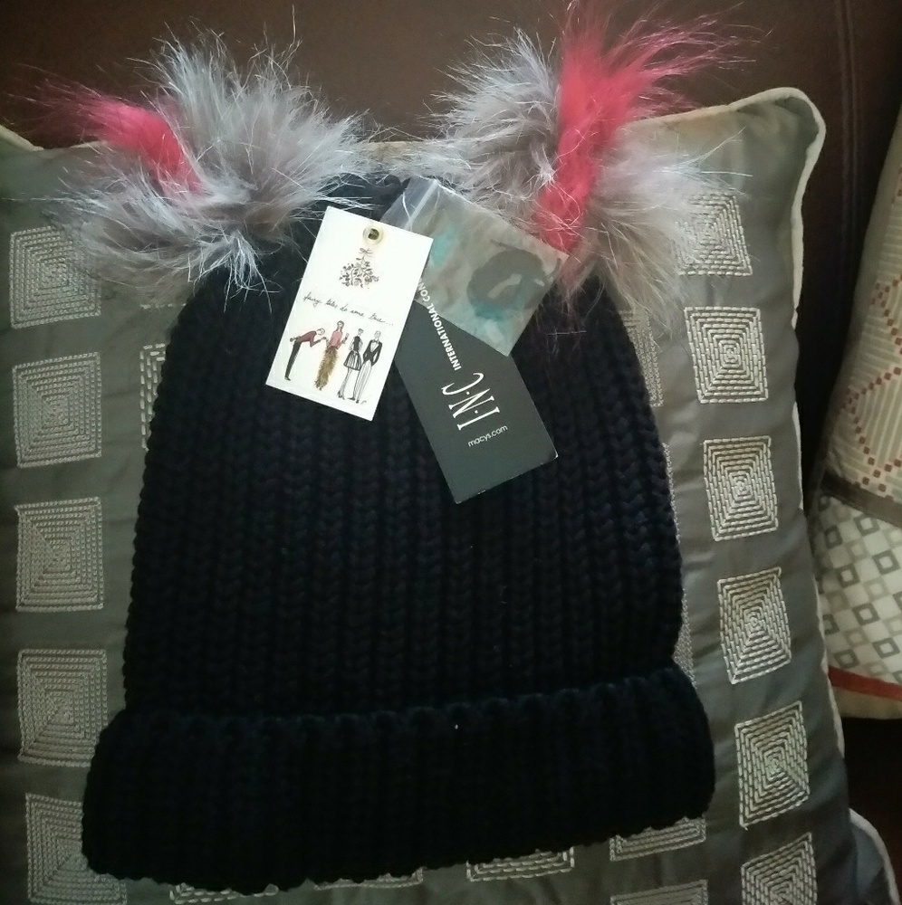 INC hat with fur balls