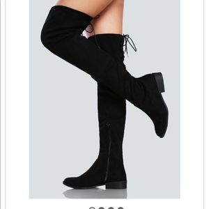 Thigh high boots worn once