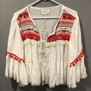 Cropped jacket with Pom Pom details