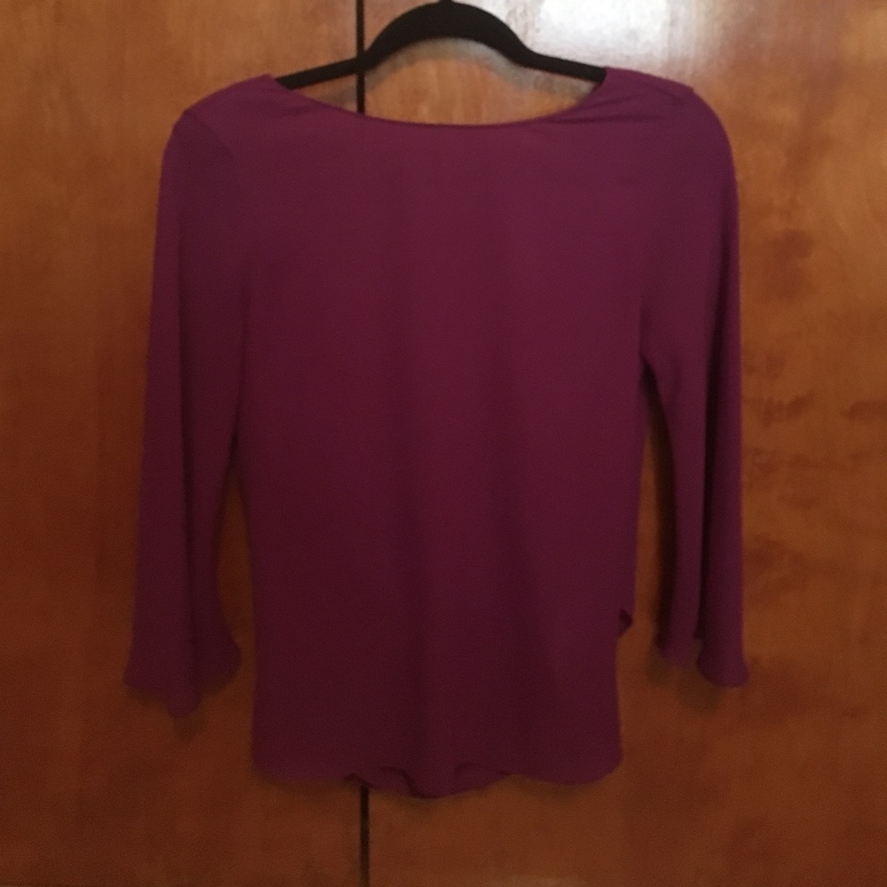 Zara long sleeved, open back shirt