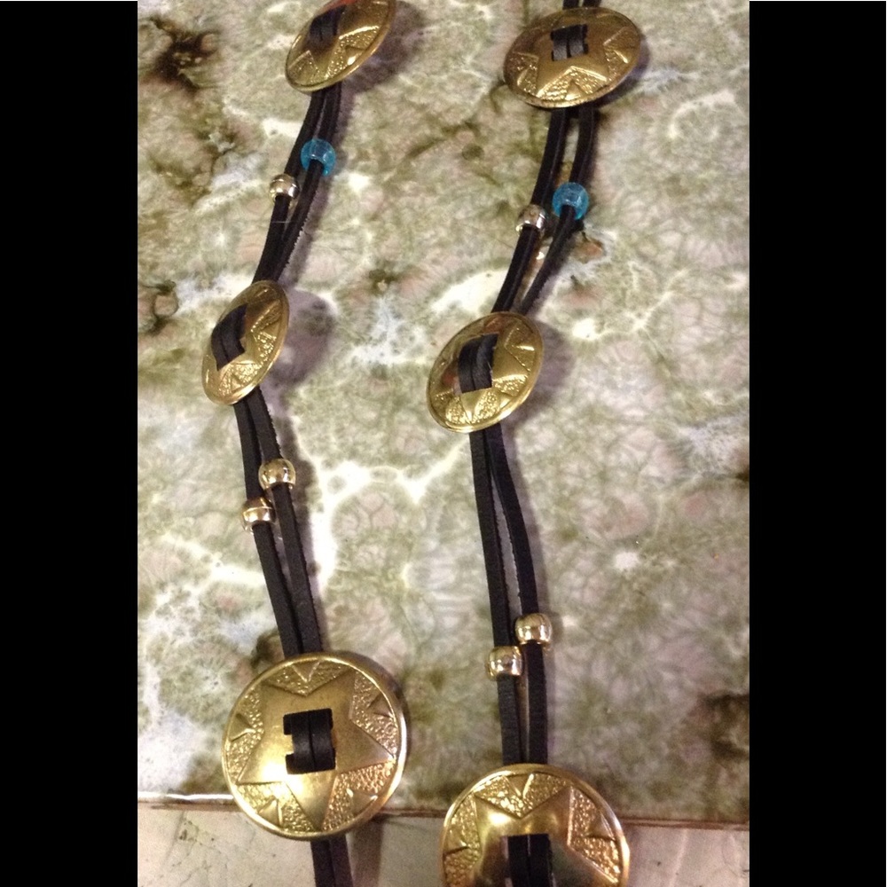 Concho belt  with bead accents.
