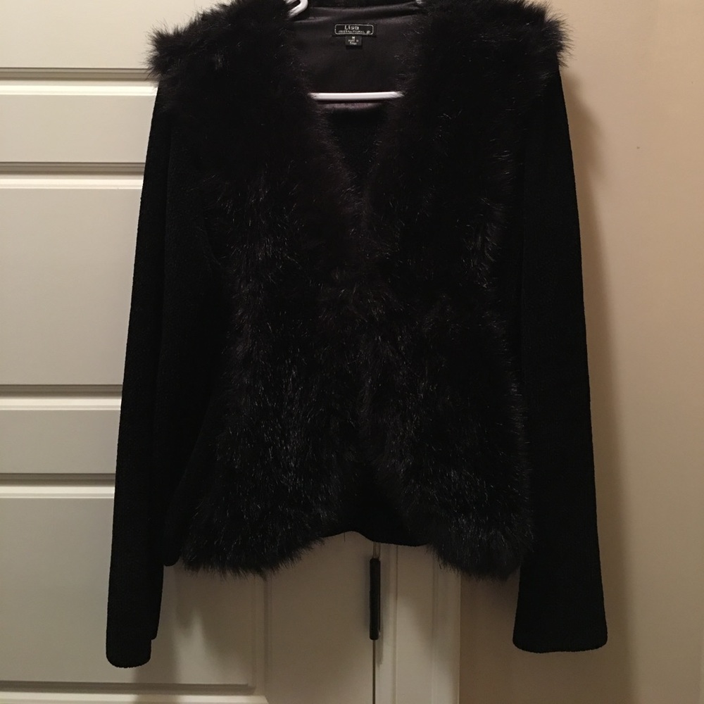 Sweater Black with fur collar.