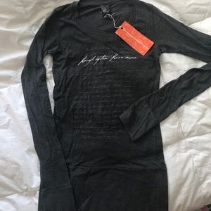 Laugh often. Love more. Long sleeved T-shirt