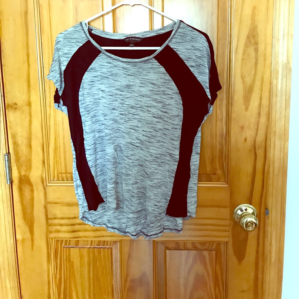 Grey & black short sleeve shirt.