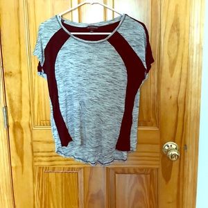 Grey & black short sleeve shirt.