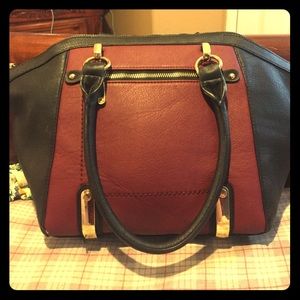Black and maroon purse.
