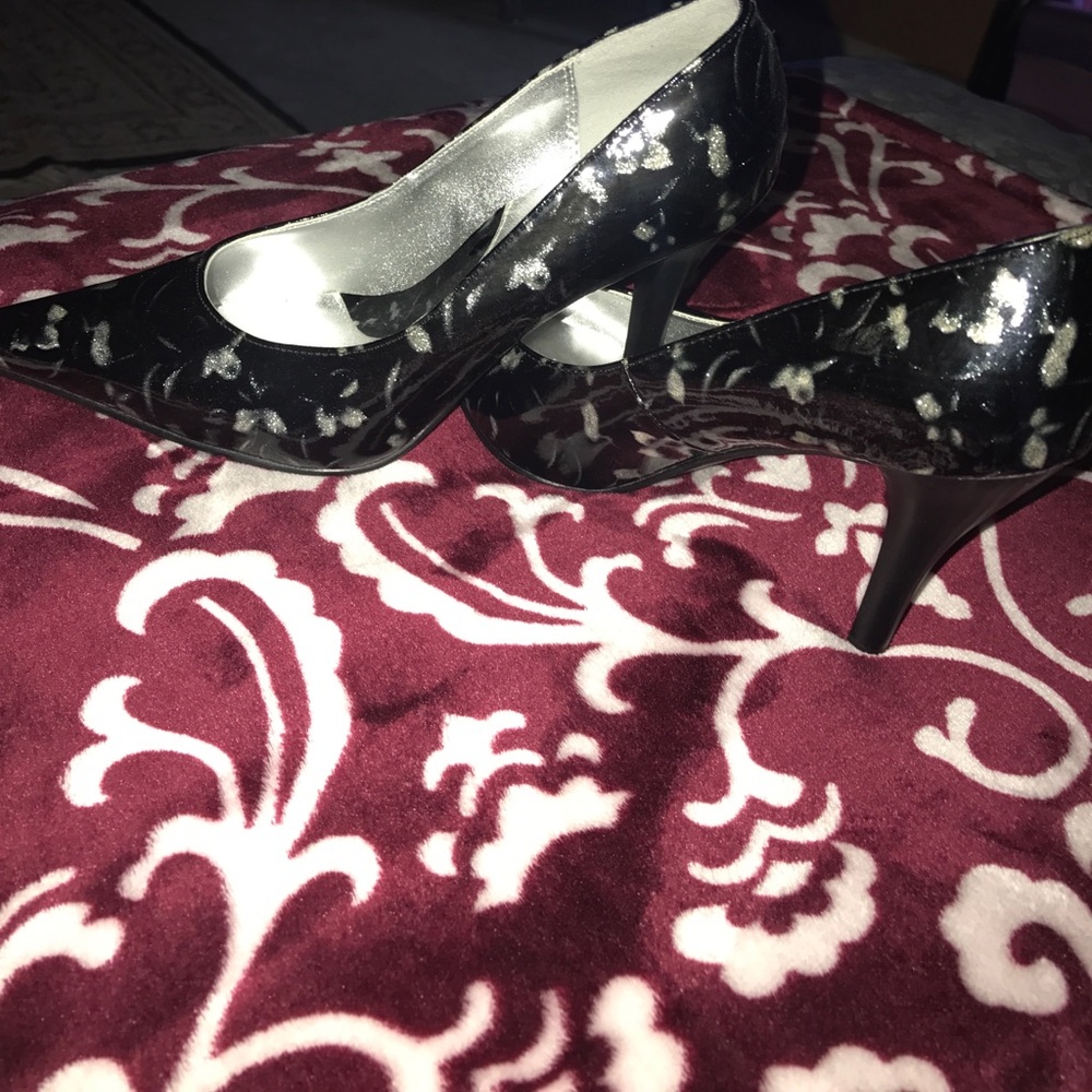 Black and silver pointed toe heels