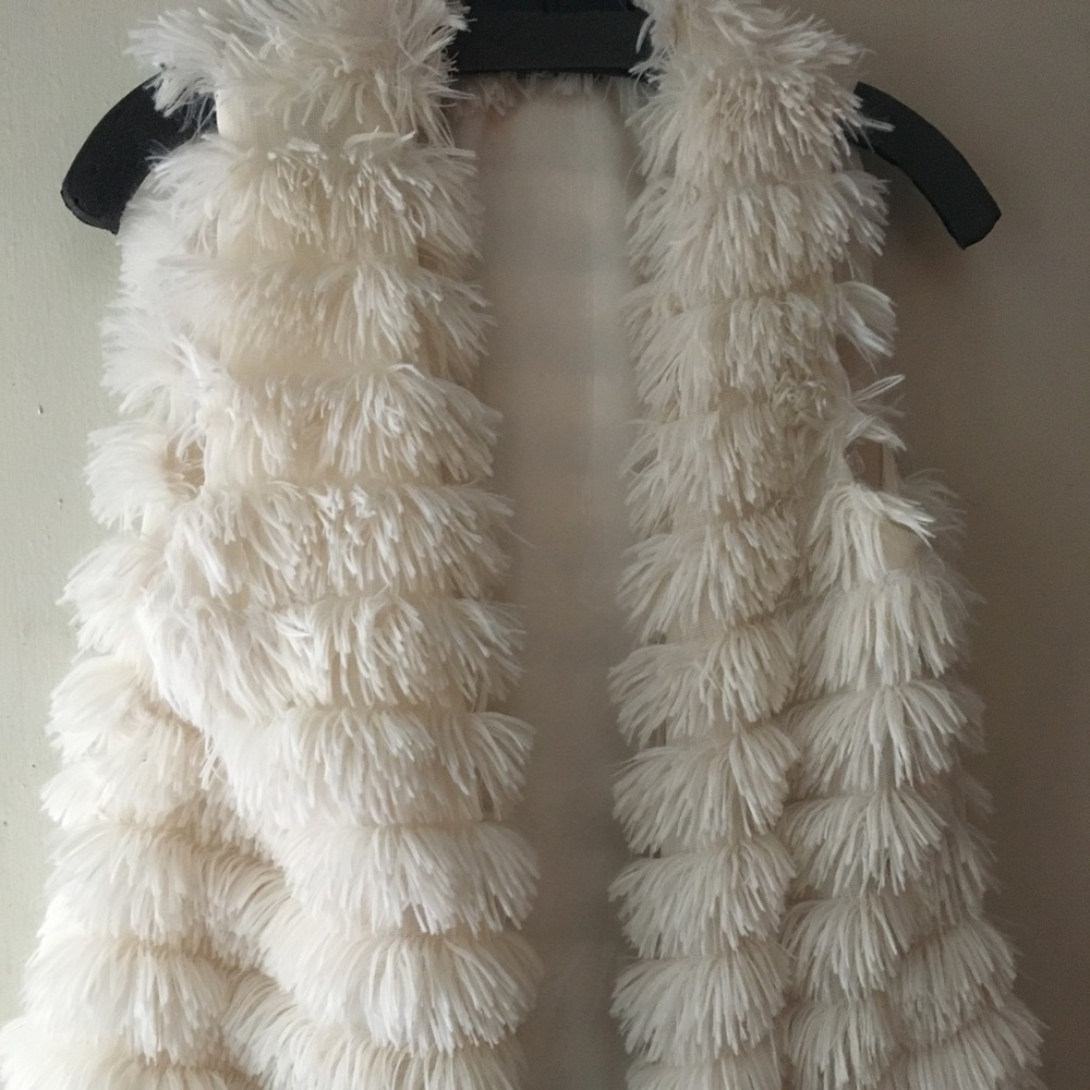 Maude white fuzzy vest