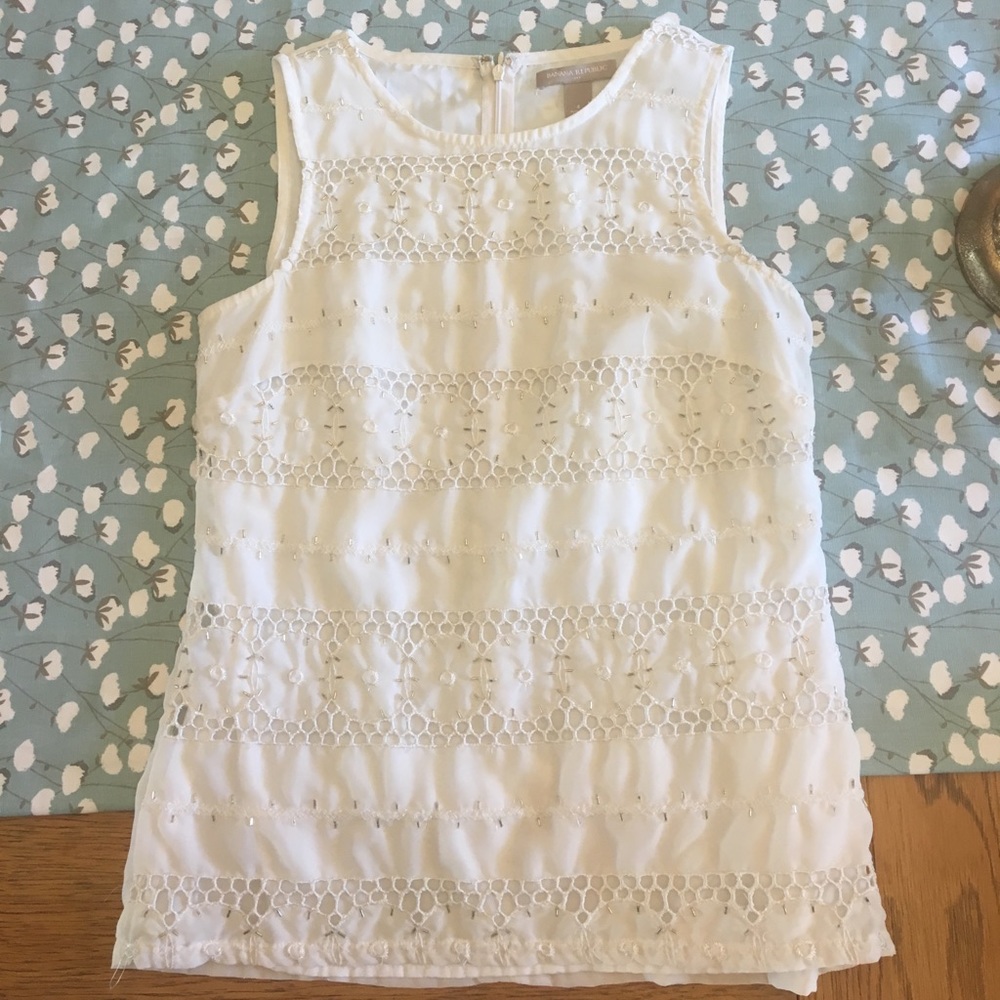 Woman's sleeveless Banana Republic blouse.
