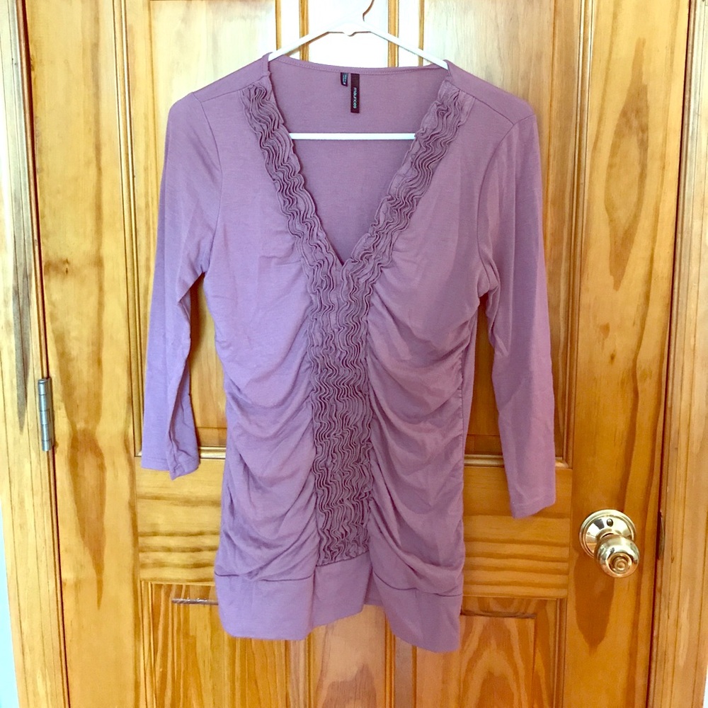 Purple ruffled front 3/4 length shirt.