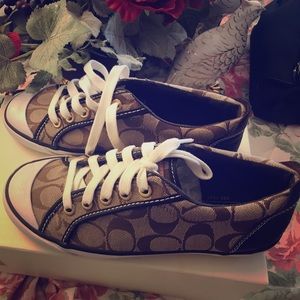 Never worn authentic Coach sneakers