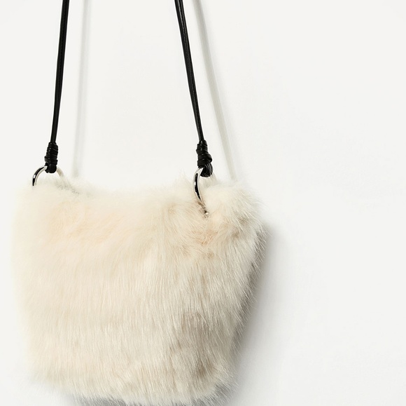 white faux fur bag