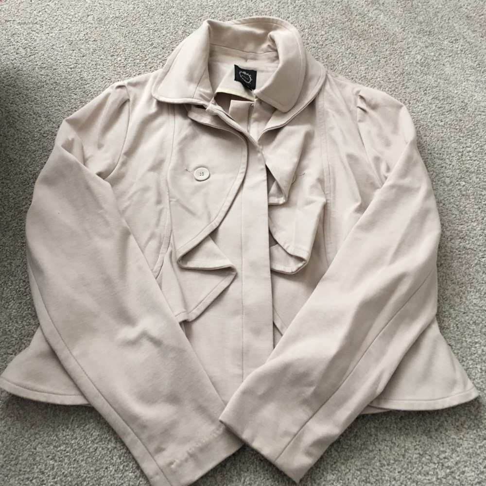 Adorable cream jacket. Lots of detail