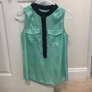Light turquoise with navy blue sleeveless top