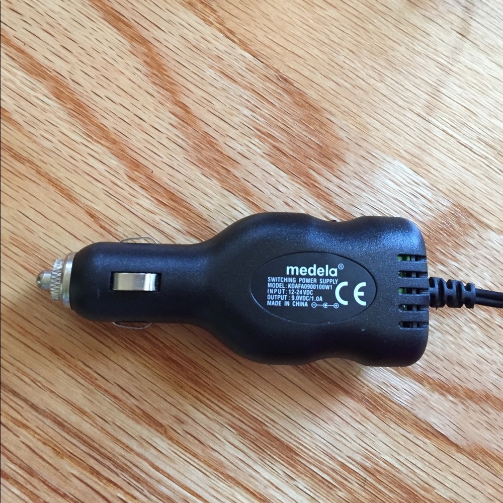 Medela 9v car adapter and Lansinoh nursing pads