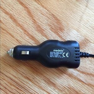 Medela 9v car adapter and Lansinoh nursing pads