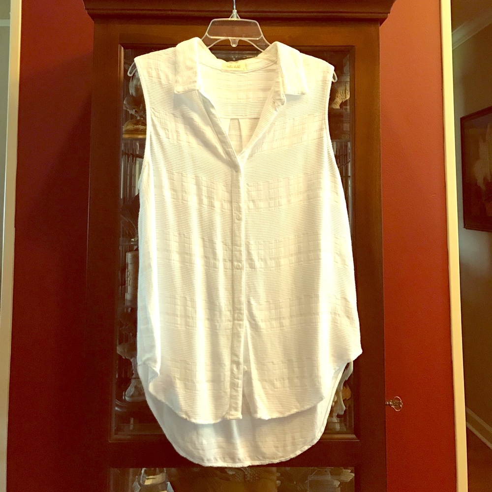Sleeveless white blouse