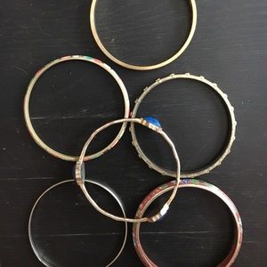 Assortment of Kate Spade and other bangles.