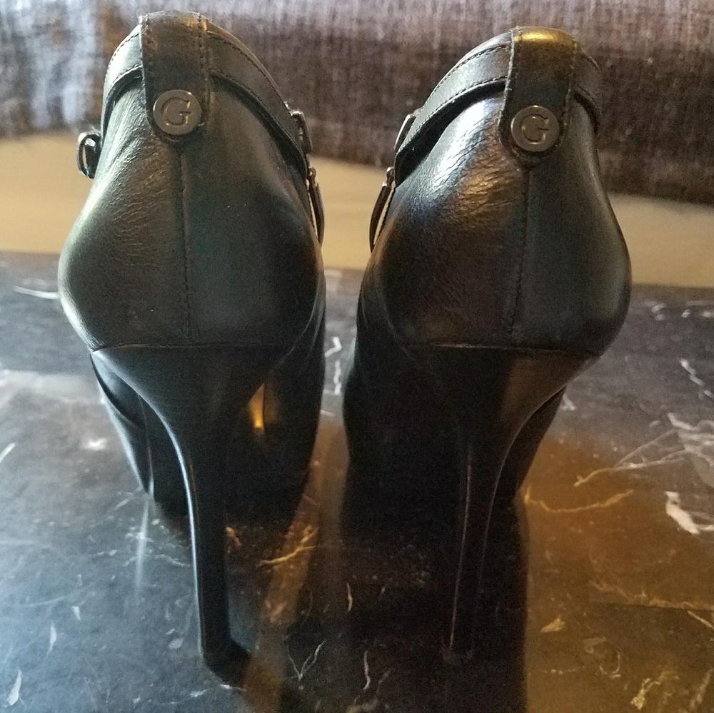 GUESS distressed black leather booties