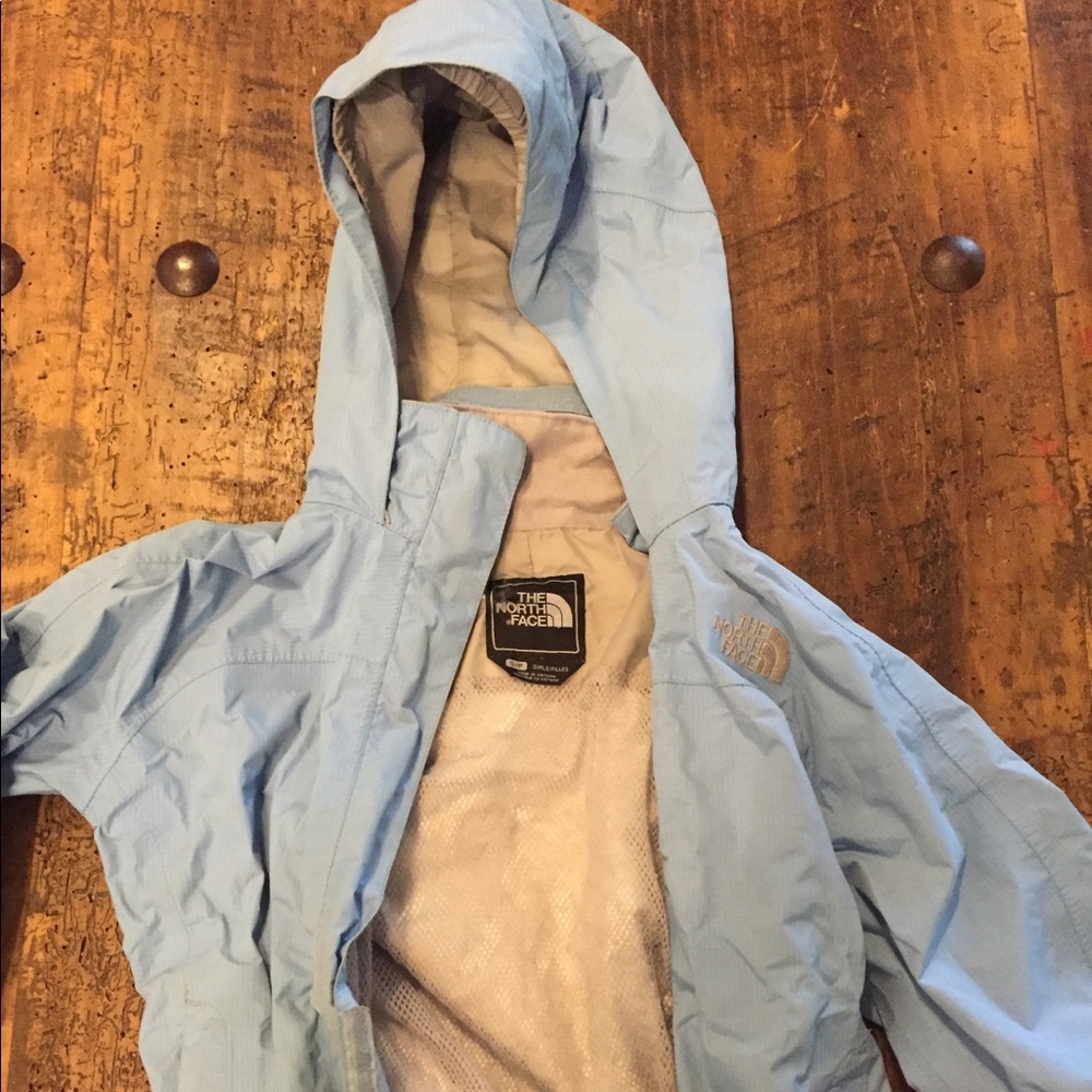 Girls North Face hooded rain jacket S light blue