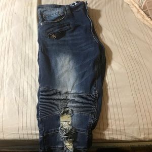 Ripped biker jeans