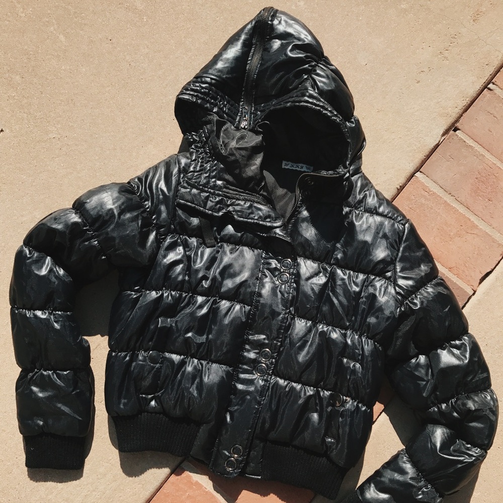 Black Quilted puff jacket.