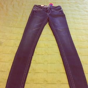 Size zero skinny jeans , stretchy type