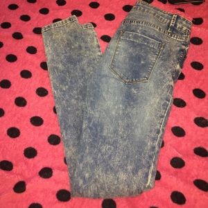 Distressed acid washed jeans