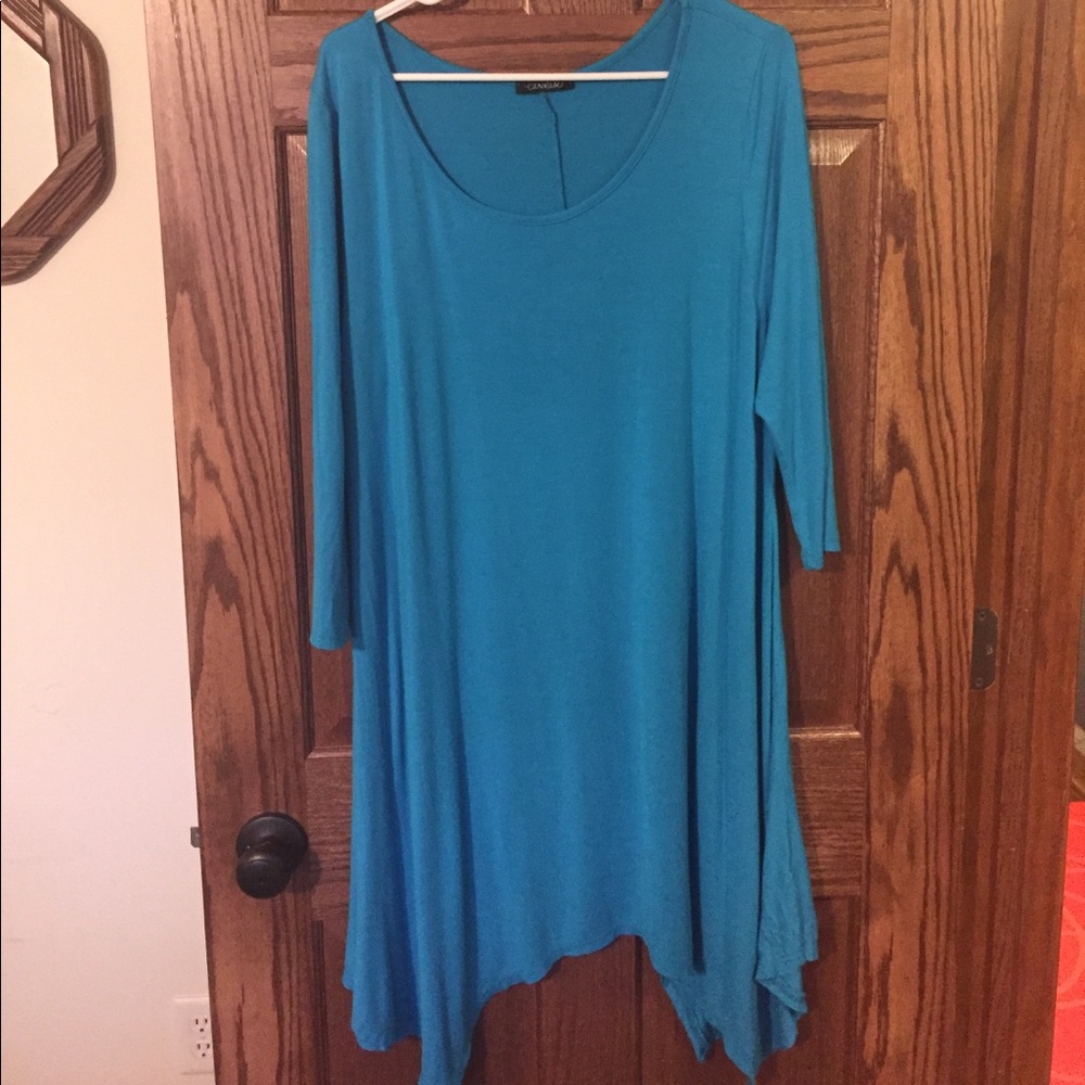 Dress with Sharkbite Hem