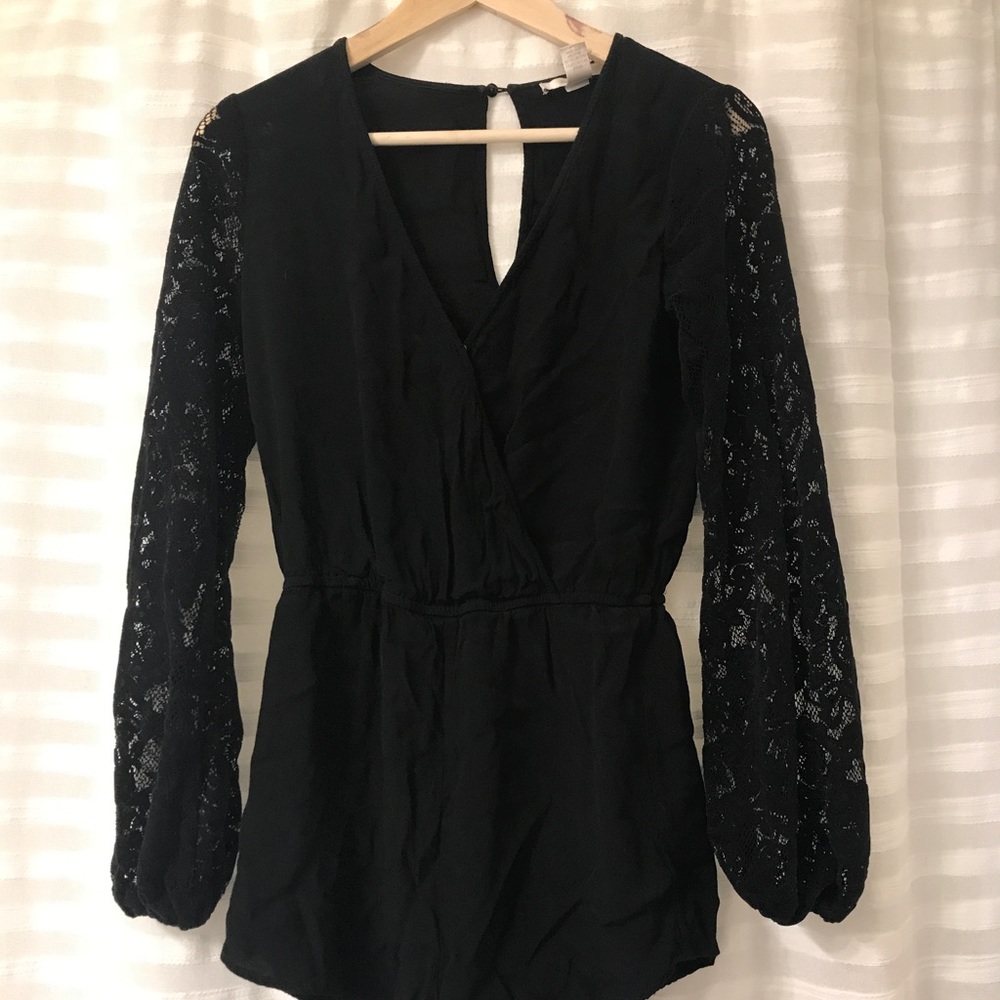 Black balloon sleeve romper