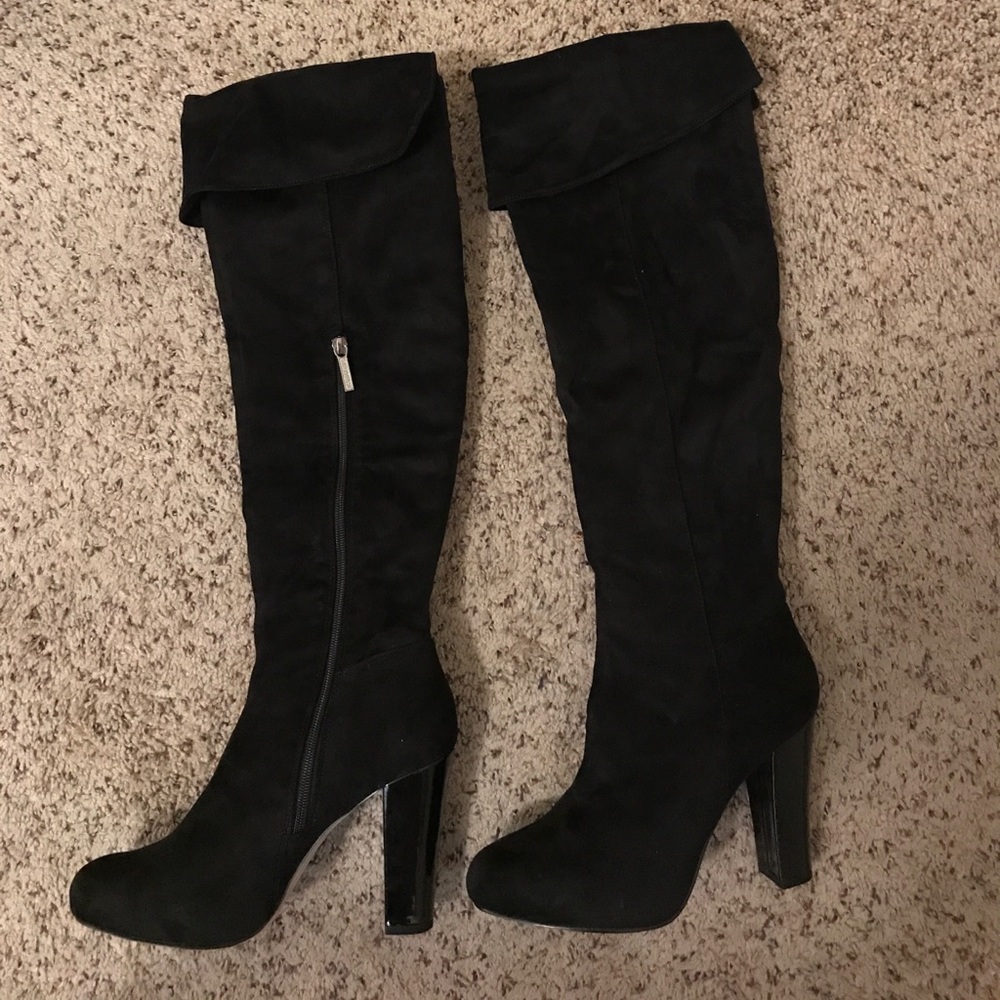 Over the knee suede boots.