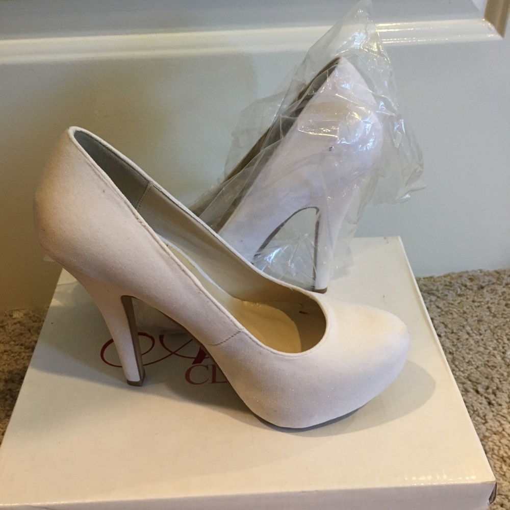 White velvet pumps