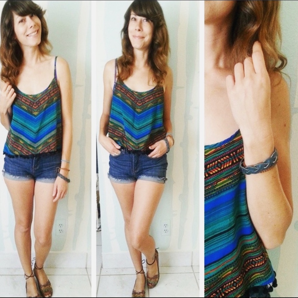 SOLD Tribal inspired crop top with black trim.
