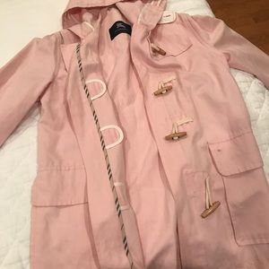 Burberry light pink toggle trench coat.