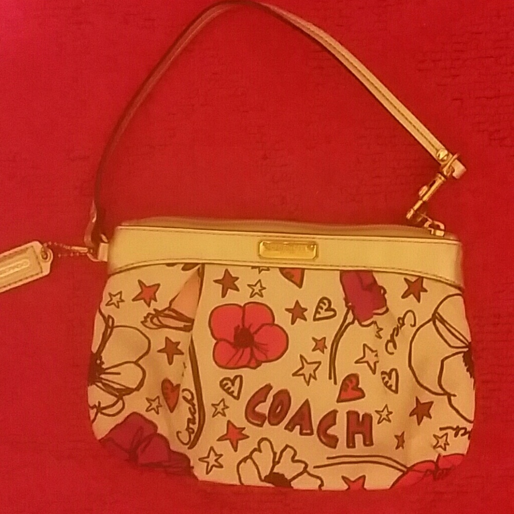 Like new COACH "POPPY" wristlet