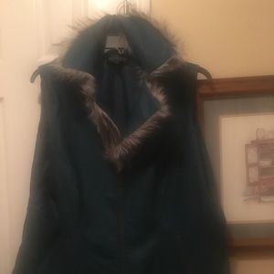 Faux leather vest with faux fur collar.