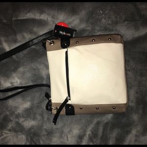Black, white, and brown over the shoulder purse!