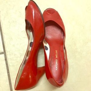 Red peep toes pumps