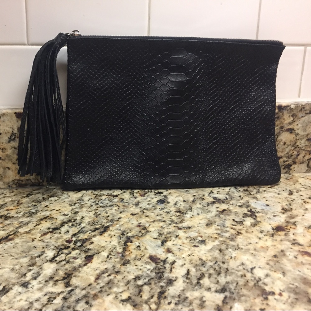 Black clutch faux snakeskin with tassel