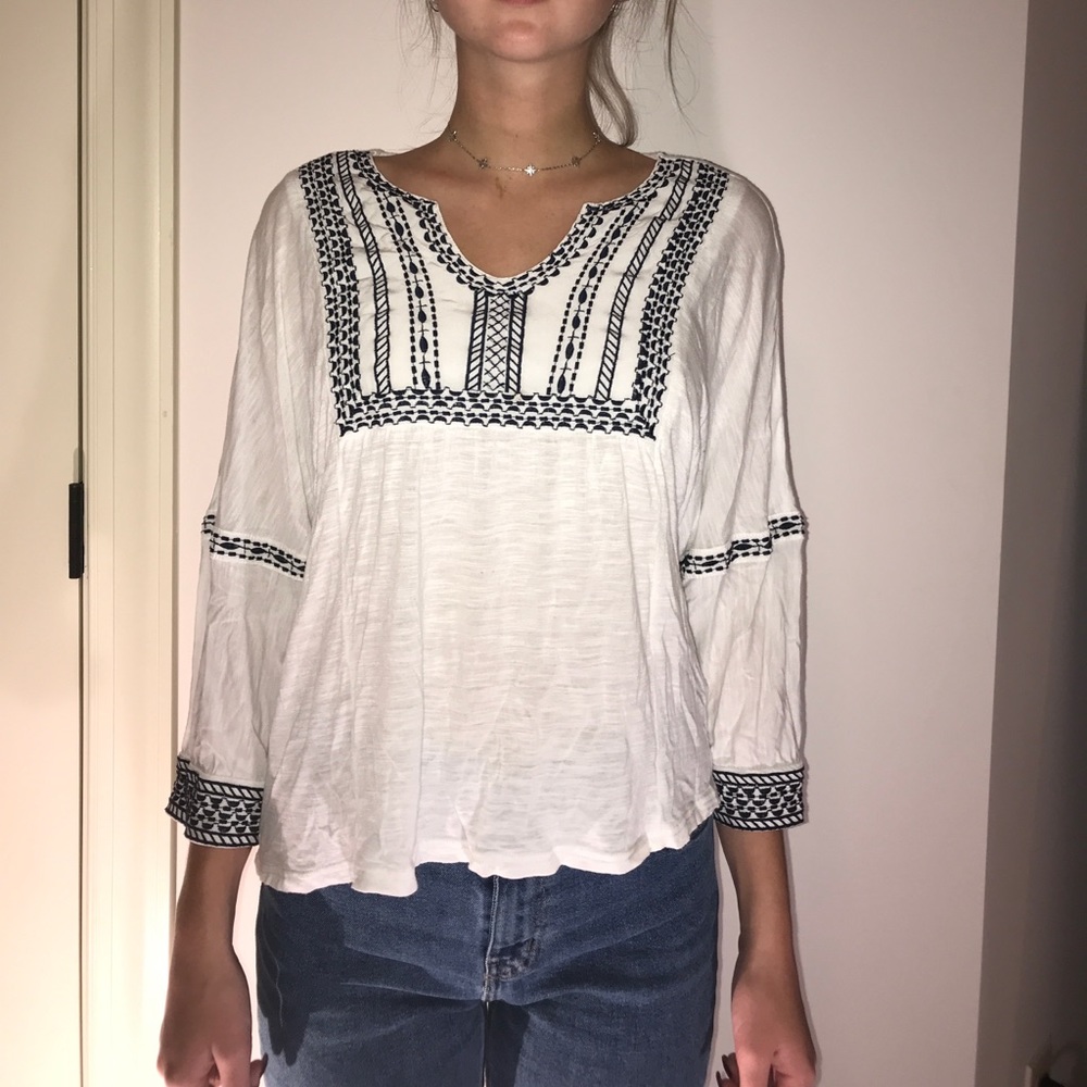 white and navy tunic