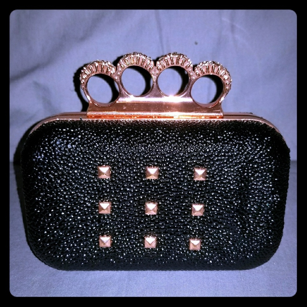 Black w/ rose gold knuckle clutch