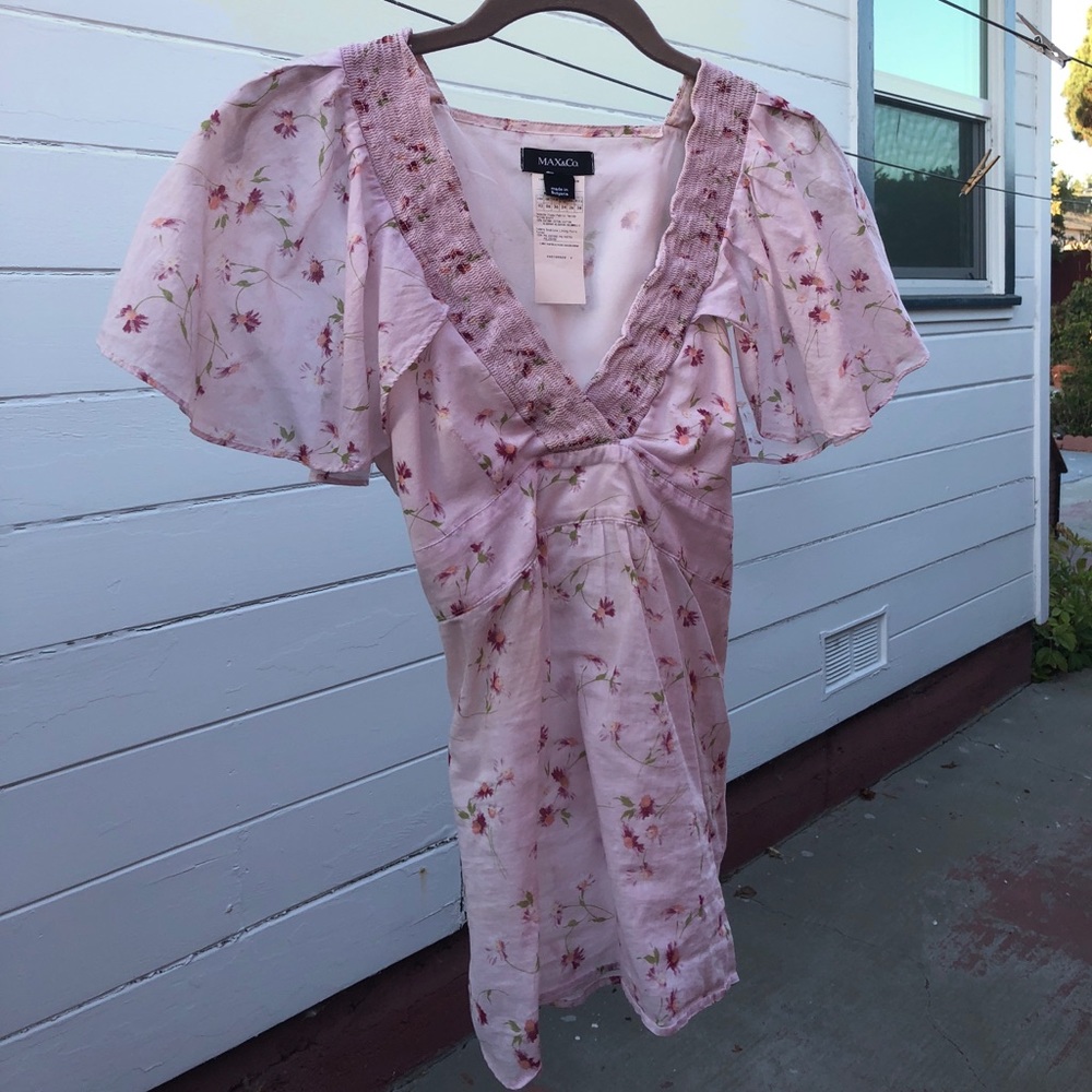 Cute shirt! Ties in back.